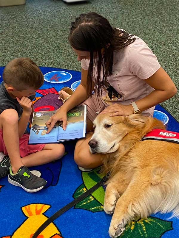 Golden PAWS Ambassador Dog, Woody at Collier County Library for Pups-n-Books Event Community Outreach